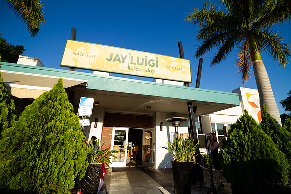 Yelp Elite members enjoying event with food at Jay Luigi Italian