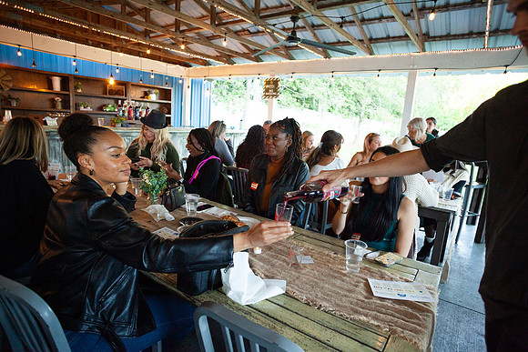 Yelp Elite members enjoying event with food